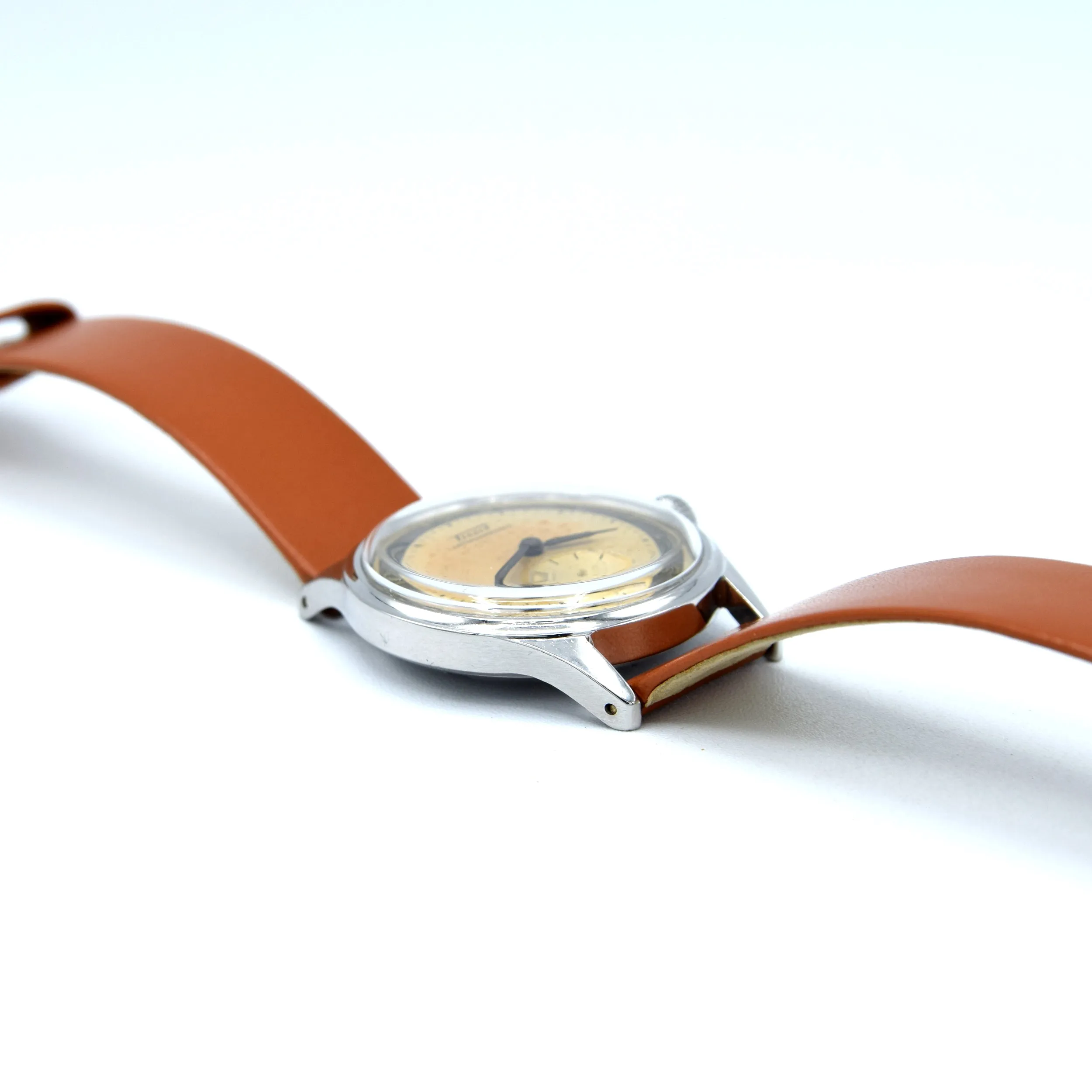 1947 Tissot Antimagnetique Manual Wind Wristwatch Model 6445-5 with Original Two Tone Radial Arabic Numeral Dial in steel