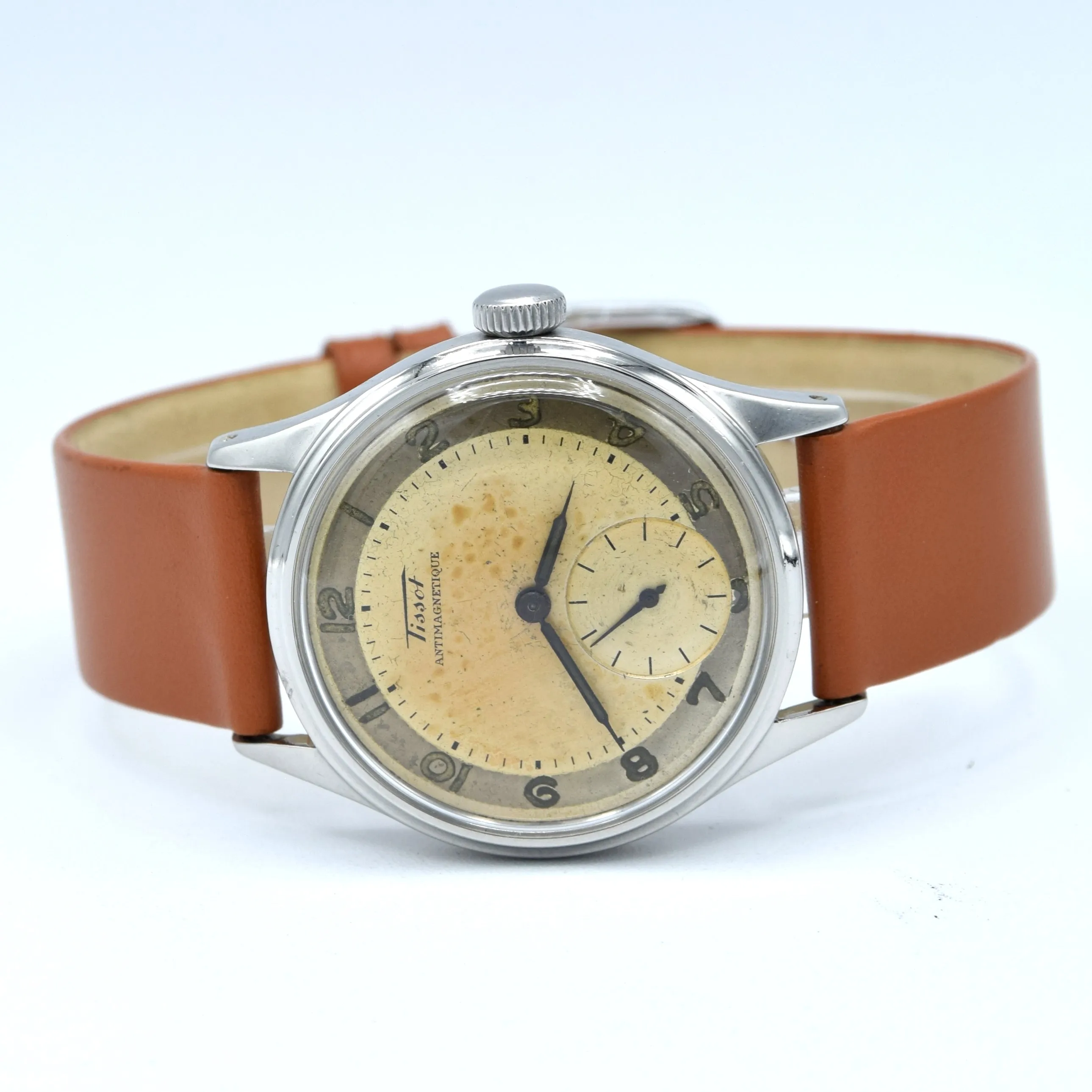 1947 Tissot Antimagnetique Manual Wind Wristwatch Model 6445-5 with Original Two Tone Radial Arabic Numeral Dial in steel