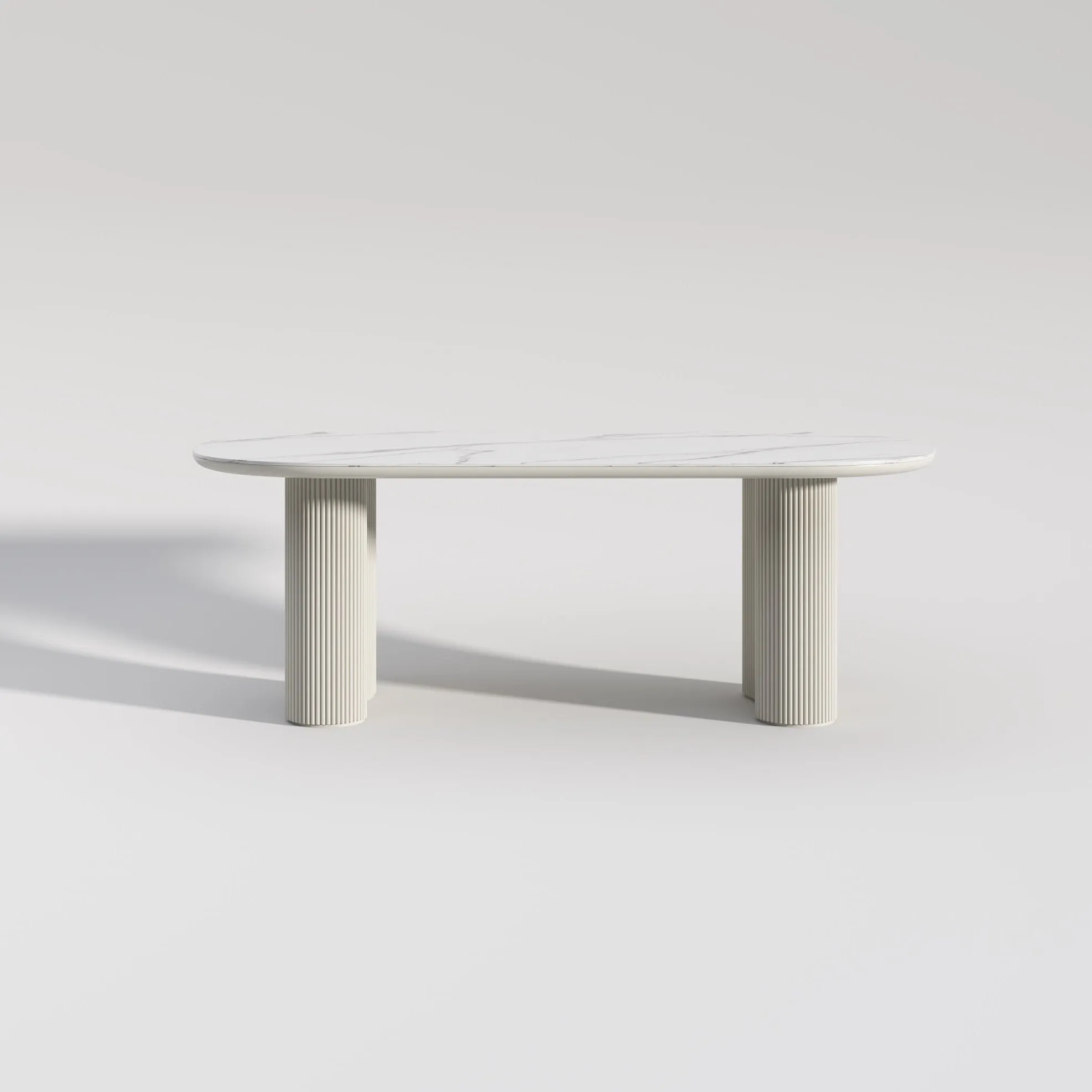 Cosmie Oval White Ceramic Top Dining Table/Ivory White Timber Legs