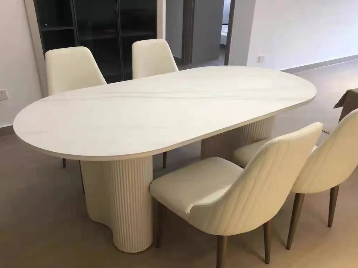 Cosmie Oval White Ceramic Top Dining Table/Ivory White Timber Legs